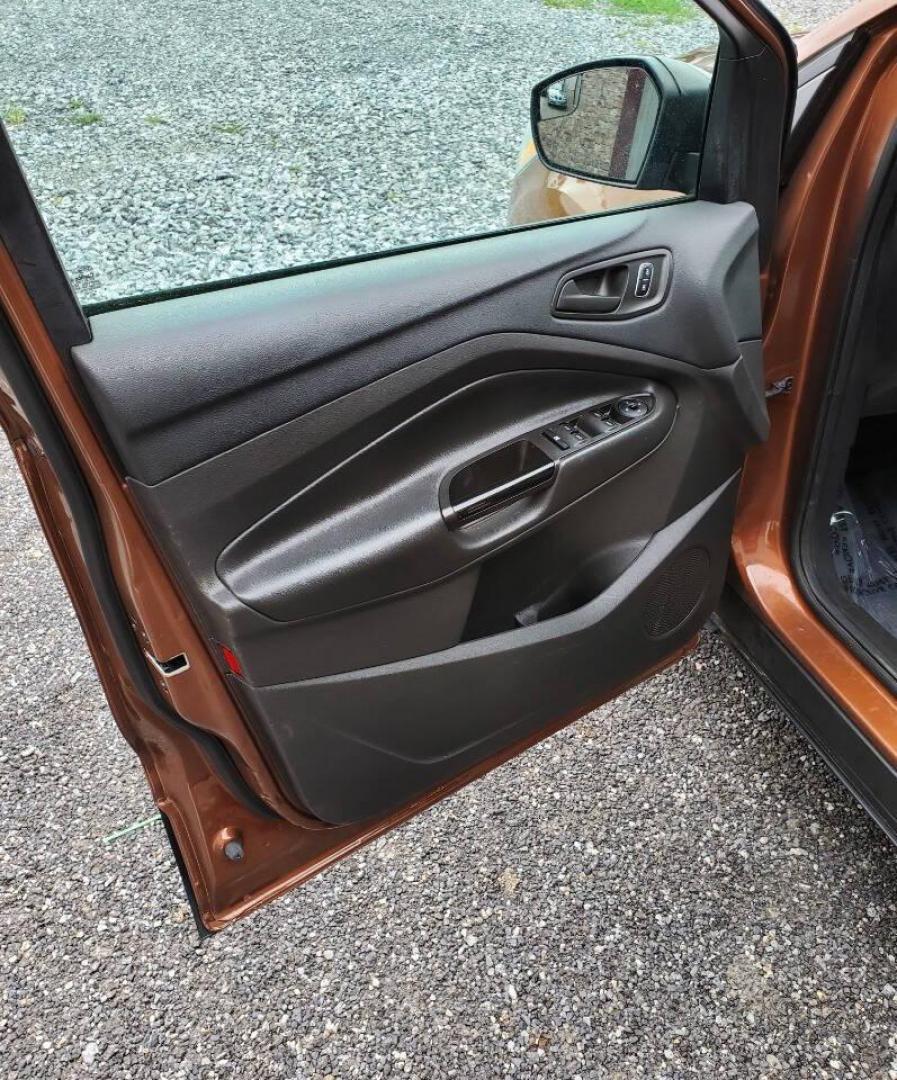 2017 Canyon Ridge Metallic Ford Escape (1FMCU0F76HU) with an 2.5L I4 2.5L I4 engine, located at 4845 Woodbury Pike, Roaring Springs, PA, (814) 317-5008, (814) 317-5008, 40.250935, -78.366959 - 2017 Ford Escape S 2.5L I4 Automatic FWD 93K miles Power Windows and Locks, A/C, CD Player, SYNC, Back-up Camera Nice Southern Vehicle! New Inspection. Vehicle comes with 3 mo./3,000-mile warranty with the option to upgrade. If interested, please call 814-317-5008 - Photo#9