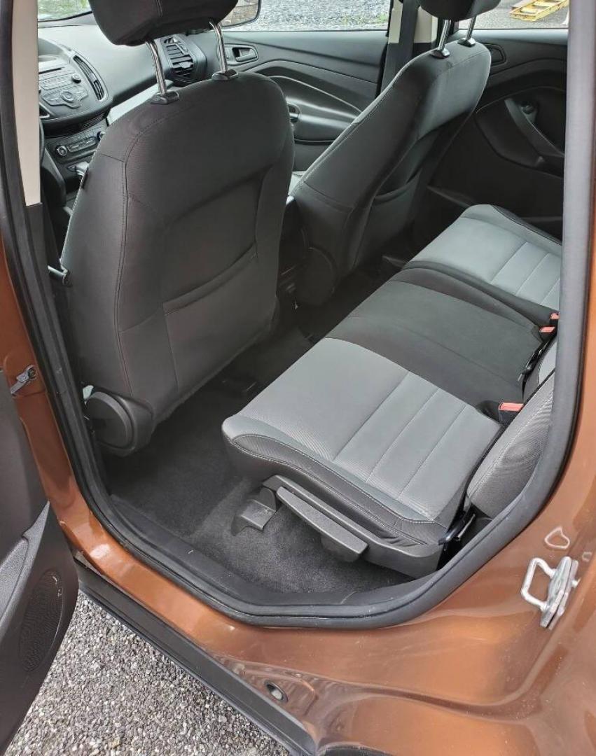 2017 Canyon Ridge Metallic Ford Escape (1FMCU0F76HU) with an 2.5L I4 2.5L I4 engine, located at 4845 Woodbury Pike, Roaring Springs, PA, (814) 317-5008, (814) 317-5008, 40.250935, -78.366959 - 2017 Ford Escape S 2.5L I4 Automatic FWD 93K miles Power Windows and Locks, A/C, CD Player, SYNC, Back-up Camera Nice Southern Vehicle! New Inspection. Vehicle comes with 3 mo./3,000-mile warranty with the option to upgrade. If interested, please call 814-317-5008 - Photo#10