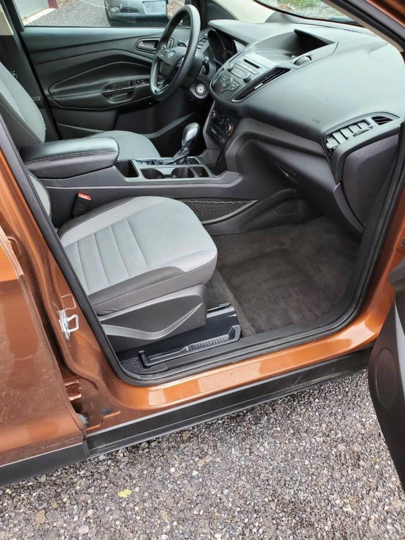 2017 Canyon Ridge Metallic Ford Escape (1FMCU0F76HU) with an 2.5L I4 2.5L I4 engine, located at 4845 Woodbury Pike, Roaring Springs, PA, (814) 317-5008, (814) 317-5008, 40.250935, -78.366959 - 2017 Ford Escape S 2.5L I4 Automatic FWD 93K miles Power Windows and Locks, A/C, CD Player, SYNC, Back-up Camera Nice Southern Vehicle! New Inspection. Vehicle comes with 3 mo./3,000-mile warranty with the option to upgrade. If interested, please call 814-317-5008 - Photo#12