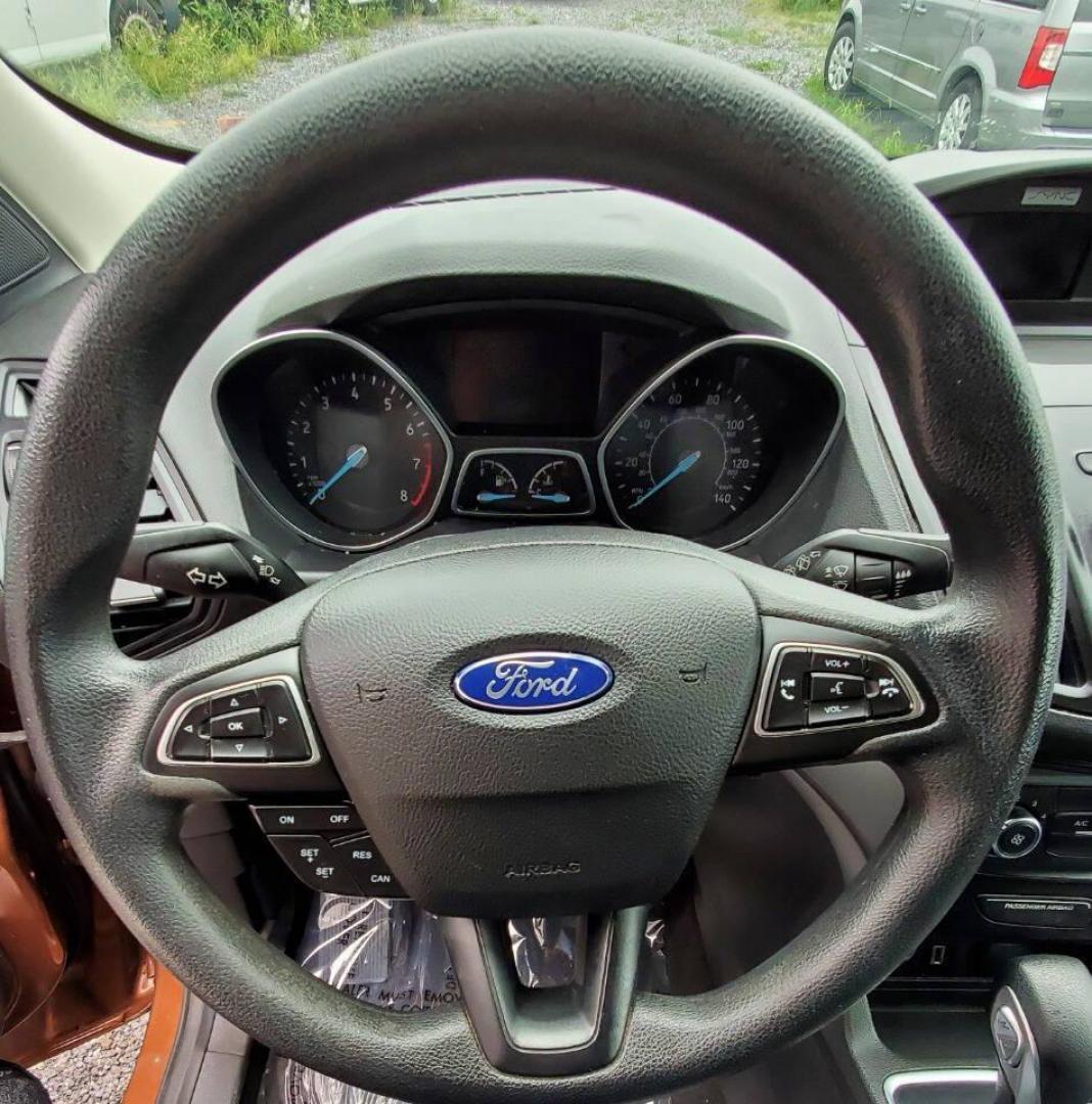 2017 Canyon Ridge Metallic Ford Escape (1FMCU0F76HU) with an 2.5L I4 2.5L I4 engine, located at 4845 Woodbury Pike, Roaring Springs, PA, (814) 317-5008, (814) 317-5008, 40.250935, -78.366959 - 2017 Ford Escape S 2.5L I4 Automatic FWD 93K miles Power Windows and Locks, A/C, CD Player, SYNC, Back-up Camera Nice Southern Vehicle! New Inspection. Vehicle comes with 3 mo./3,000-mile warranty with the option to upgrade. If interested, please call 814-317-5008 - Photo#17