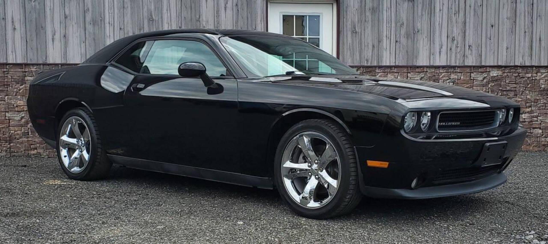 2013 Black Dodge Challenger (2C3CDYAG0DH) with an 3.6L V6 3.6L V6 engine, located at 4845 Woodbury Pike, Roaring Springs, PA, (814) 317-5008, (814) 317-5008, 40.250935, -78.366959 - 2013 Dodge Challenger SXT Plus 3.6L V6 Automatic 80K Miles Leather Seats, Cold A/C, Like New Tires, Keyless Entry, Single CD, Sirius XM, Bluetooth, Heated Driver and Passenger Seats, Braking Assist, New Inspection. Clean Southern Vehicle! It will come with a 3 mo./3,000-mile warranty with the option - Photo#0