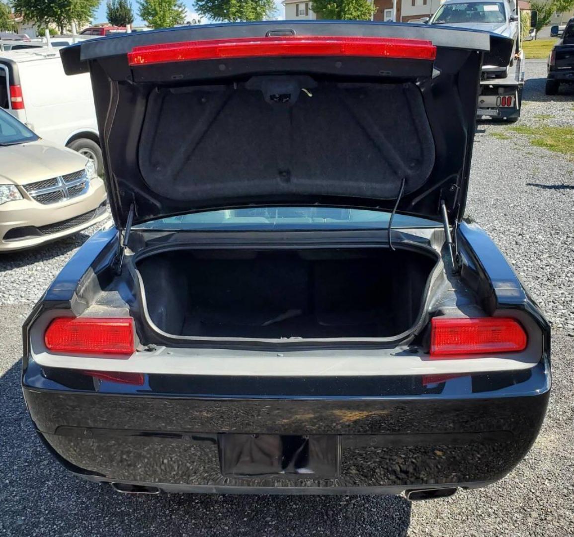 2013 Black Dodge Challenger (2C3CDYAG0DH) with an 3.6L V6 3.6L V6 engine, located at 4845 Woodbury Pike, Roaring Springs, PA, (814) 317-5008, (814) 317-5008, 40.250935, -78.366959 - 2013 Dodge Challenger SXT Plus 3.6L V6 Automatic 80K Miles Leather Seats, Cold A/C, Like New Tires, Keyless Entry, Single CD, Sirius XM, Bluetooth, Heated Driver and Passenger Seats, Braking Assist, New Inspection. Clean Southern Vehicle! It will come with a 3 mo./3,000-mile warranty with the option - Photo#3