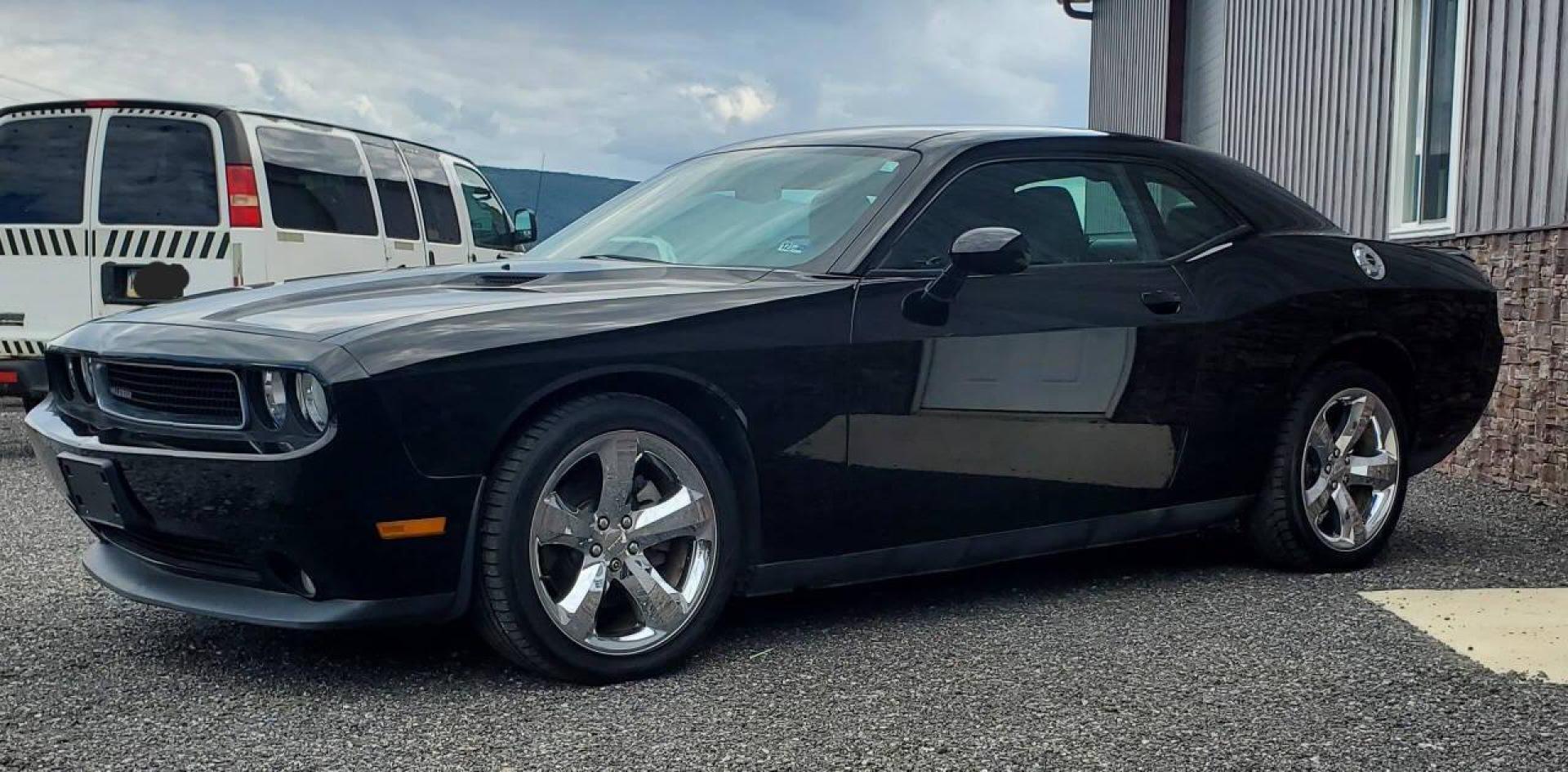 2013 Black Dodge Challenger (2C3CDYAG0DH) with an 3.6L V6 3.6L V6 engine, located at 4845 Woodbury Pike, Roaring Springs, PA, (814) 317-5008, (814) 317-5008, 40.250935, -78.366959 - 2013 Dodge Challenger SXT Plus 3.6L V6 Automatic 80K Miles Leather Seats, Cold A/C, Like New Tires, Keyless Entry, Single CD, Sirius XM, Bluetooth, Heated Driver and Passenger Seats, Braking Assist, New Inspection. Clean Southern Vehicle! It will come with a 3 mo./3,000-mile warranty with the option - Photo#4