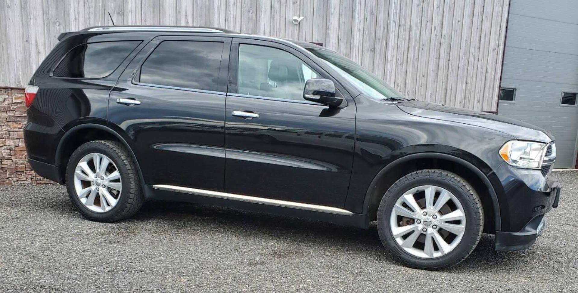 2013 Black Dodge Durango (1C4SDJDT3DC) with an 5.7L V8 5.7L V8 engine, located at 4845 Woodbury Pike, Roaring Springs, PA, (814) 317-5008, (814) 317-5008, 40.250935, -78.366959 - 2013 Dodge Durango Crew Hemi AWD 5.7L V8 6-speed Automatic 3rd Row Seating, Leather, Heated Driver/Passenger/Rear Seats, Sunroof, A/C, Keyless Entry, Remote Start, Premium Alpine Stereo with In-Dash Single CD and Sirius XM, Backup Camera, Like New Tires, New Inspection. Vehicle has a new crate engin - Photo#1