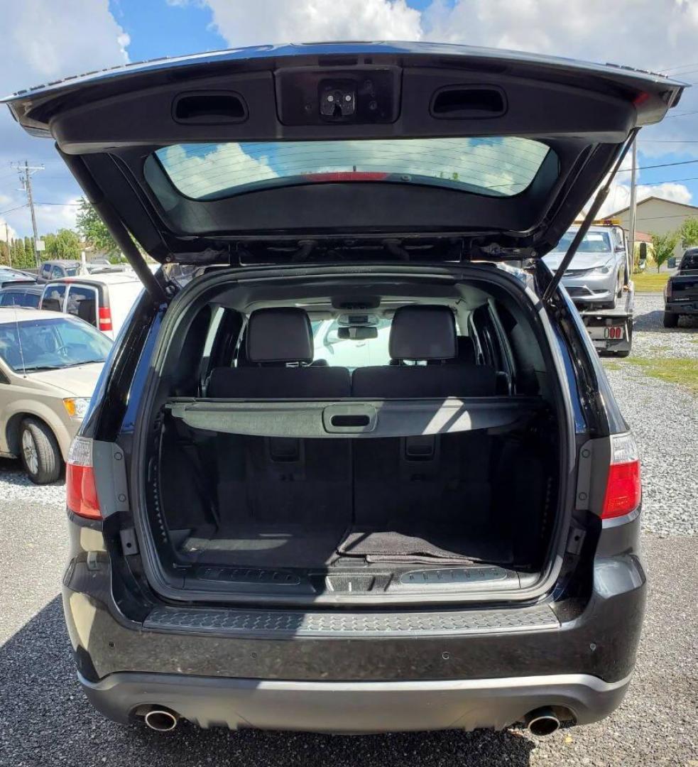 2013 Black Dodge Durango (1C4SDJDT3DC) with an 5.7L V8 5.7L V8 engine, located at 4845 Woodbury Pike, Roaring Springs, PA, (814) 317-5008, (814) 317-5008, 40.250935, -78.366959 - 2013 Dodge Durango Crew Hemi AWD 5.7L V8 6-speed Automatic 3rd Row Seating, Leather, Heated Driver/Passenger/Rear Seats, Sunroof, A/C, Keyless Entry, Remote Start, Premium Alpine Stereo with In-Dash Single CD and Sirius XM, Backup Camera, Like New Tires, New Inspection. Vehicle has a new crate engin - Photo#3
