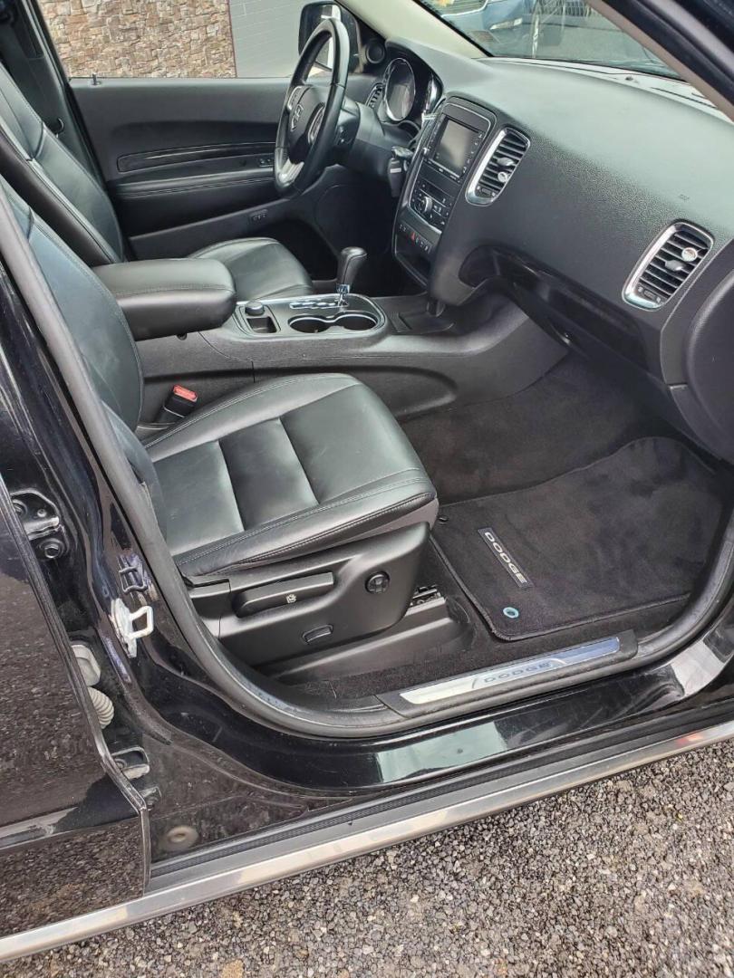 2013 Black Dodge Durango (1C4SDJDT3DC) with an 5.7L V8 5.7L V8 engine, located at 4845 Woodbury Pike, Roaring Springs, PA, (814) 317-5008, (814) 317-5008, 40.250935, -78.366959 - 2013 Dodge Durango Crew Hemi AWD 5.7L V8 6-speed Automatic 3rd Row Seating, Leather, Heated Driver/Passenger/Rear Seats, Sunroof, A/C, Keyless Entry, Remote Start, Premium Alpine Stereo with In-Dash Single CD and Sirius XM, Backup Camera, Like New Tires, New Inspection. Vehicle has a new crate engin - Photo#16