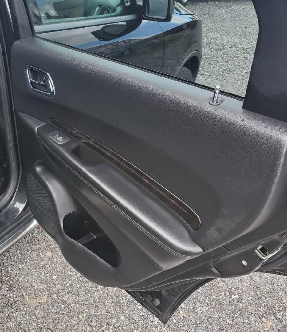 2013 Black Dodge Durango (1C4SDJDT3DC) with an 5.7L V8 5.7L V8 engine, located at 4845 Woodbury Pike, Roaring Springs, PA, (814) 317-5008, (814) 317-5008, 40.250935, -78.366959 - 2013 Dodge Durango Crew Hemi AWD 5.7L V8 6-speed Automatic 3rd Row Seating, Leather, Heated Driver/Passenger/Rear Seats, Sunroof, A/C, Keyless Entry, Remote Start, Premium Alpine Stereo with In-Dash Single CD and Sirius XM, Backup Camera, Like New Tires, New Inspection. Vehicle has a new crate engin - Photo#20