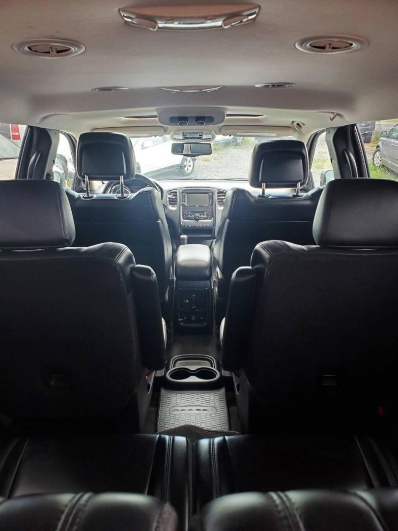 2013 Black Dodge Durango (1C4SDJDT3DC) with an 5.7L V8 5.7L V8 engine, located at 4845 Woodbury Pike, Roaring Springs, PA, (814) 317-5008, (814) 317-5008, 40.250935, -78.366959 - 2013 Dodge Durango Crew Hemi AWD 5.7L V8 6-speed Automatic 3rd Row Seating, Leather, Heated Driver/Passenger/Rear Seats, Sunroof, A/C, Keyless Entry, Remote Start, Premium Alpine Stereo with In-Dash Single CD and Sirius XM, Backup Camera, Like New Tires, New Inspection. Vehicle has a new crate engin - Photo#21