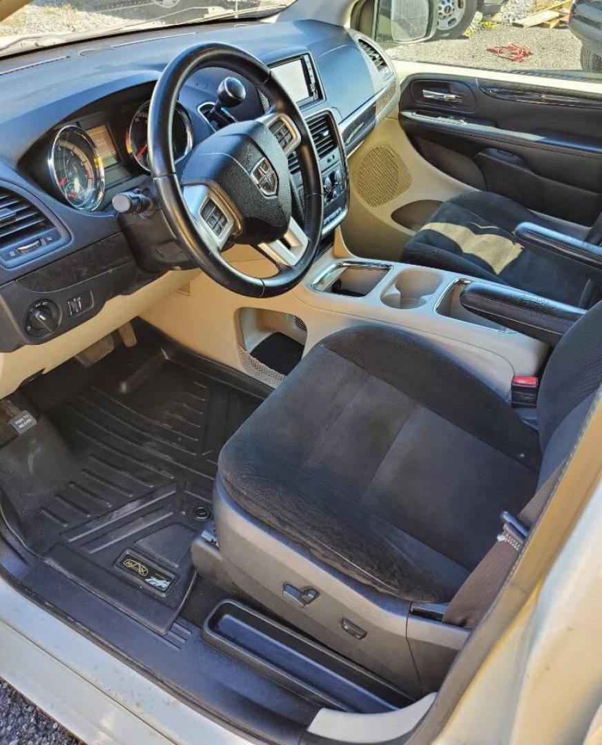 2015 White Dodge Grand Caravan (2C4RDGCG4FR) with an 3.6L V6 3.6L V6 engine, located at 4845 Woodbury Pike, Roaring Springs, PA, (814) 317-5008, (814) 317-5008, 40.250935, -78.366959 - 2015 Dodge Grand Caravan SXT 3.6L V6 Automatic 149k Miles FWD Third Row Seating This van is loaded! Sirius Radio with Single Disc CD Player, Bluetooth, DVD Player with Remote, Rear Folding Seats, Back-up Camera, Power Liftgate. Priced low because it has an R-Title due to a cracked bumper and dent in - Photo#8