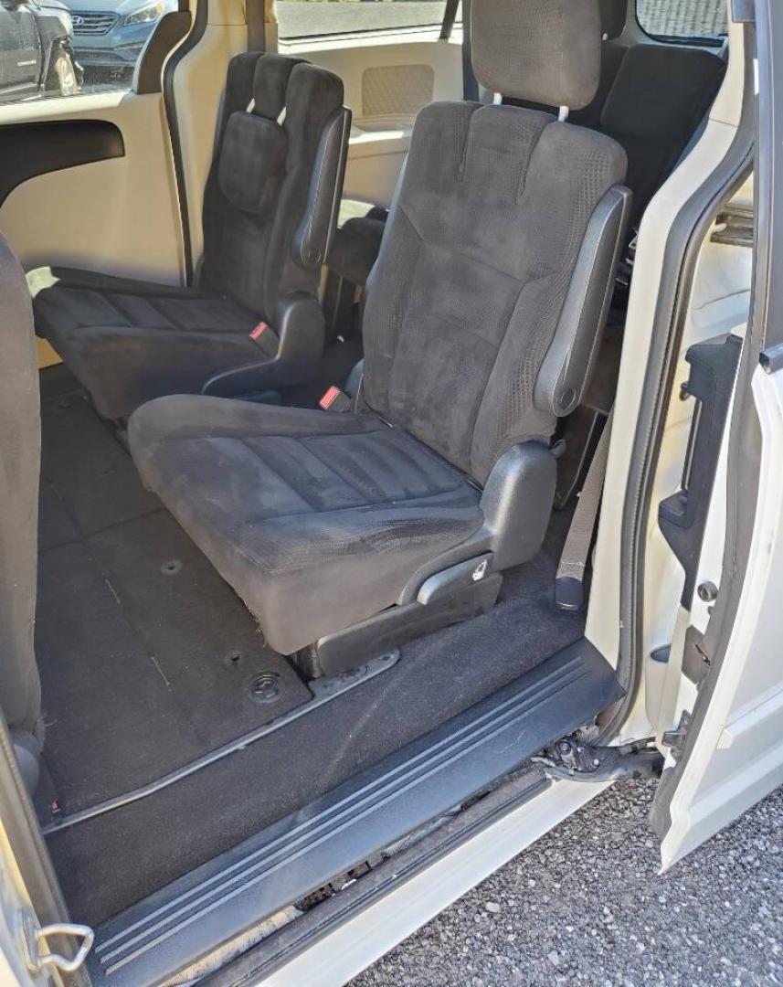 2015 White Dodge Grand Caravan (2C4RDGCG4FR) with an 3.6L V6 3.6L V6 engine, located at 4845 Woodbury Pike, Roaring Springs, PA, (814) 317-5008, (814) 317-5008, 40.250935, -78.366959 - 2015 Dodge Grand Caravan SXT 3.6L V6 Automatic 149k Miles FWD Third Row Seating This van is loaded! Sirius Radio with Single Disc CD Player, Bluetooth, DVD Player with Remote, Rear Folding Seats, Back-up Camera, Power Liftgate. Priced low because it has an R-Title due to a cracked bumper and dent in - Photo#10