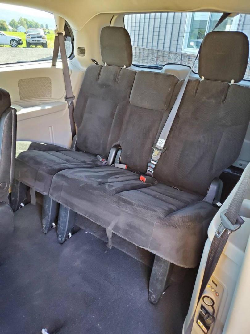 2015 White Dodge Grand Caravan (2C4RDGCG4FR) with an 3.6L V6 3.6L V6 engine, located at 4845 Woodbury Pike, Roaring Springs, PA, (814) 317-5008, (814) 317-5008, 40.250935, -78.366959 - 2015 Dodge Grand Caravan SXT 3.6L V6 Automatic 149k Miles FWD Third Row Seating This van is loaded! Sirius Radio with Single Disc CD Player, Bluetooth, DVD Player with Remote, Rear Folding Seats, Back-up Camera, Power Liftgate. Priced low because it has an R-Title due to a cracked bumper and dent in - Photo#11