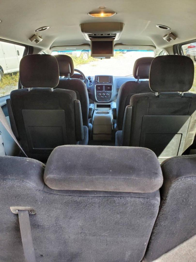 2015 White Dodge Grand Caravan (2C4RDGCG4FR) with an 3.6L V6 3.6L V6 engine, located at 4845 Woodbury Pike, Roaring Springs, PA, (814) 317-5008, (814) 317-5008, 40.250935, -78.366959 - 2015 Dodge Grand Caravan SXT 3.6L V6 Automatic 149k Miles FWD Third Row Seating This van is loaded! Sirius Radio with Single Disc CD Player, Bluetooth, DVD Player with Remote, Rear Folding Seats, Back-up Camera, Power Liftgate. Priced low because it has an R-Title due to a cracked bumper and dent in - Photo#15