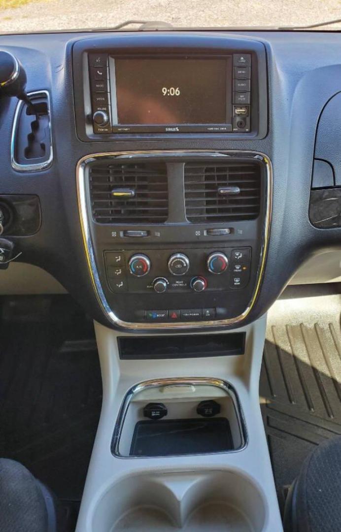 2015 White Dodge Grand Caravan (2C4RDGCG4FR) with an 3.6L V6 3.6L V6 engine, located at 4845 Woodbury Pike, Roaring Springs, PA, (814) 317-5008, (814) 317-5008, 40.250935, -78.366959 - 2015 Dodge Grand Caravan SXT 3.6L V6 Automatic 149k Miles FWD Third Row Seating This van is loaded! Sirius Radio with Single Disc CD Player, Bluetooth, DVD Player with Remote, Rear Folding Seats, Back-up Camera, Power Liftgate. Priced low because it has an R-Title due to a cracked bumper and dent in - Photo#16