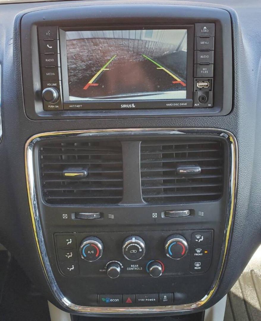 2015 White Dodge Grand Caravan (2C4RDGCG4FR) with an 3.6L V6 3.6L V6 engine, located at 4845 Woodbury Pike, Roaring Springs, PA, (814) 317-5008, (814) 317-5008, 40.250935, -78.366959 - 2015 Dodge Grand Caravan SXT 3.6L V6 Automatic 149k Miles FWD Third Row Seating This van is loaded! Sirius Radio with Single Disc CD Player, Bluetooth, DVD Player with Remote, Rear Folding Seats, Back-up Camera, Power Liftgate. Priced low because it has an R-Title due to a cracked bumper and dent in - Photo#17