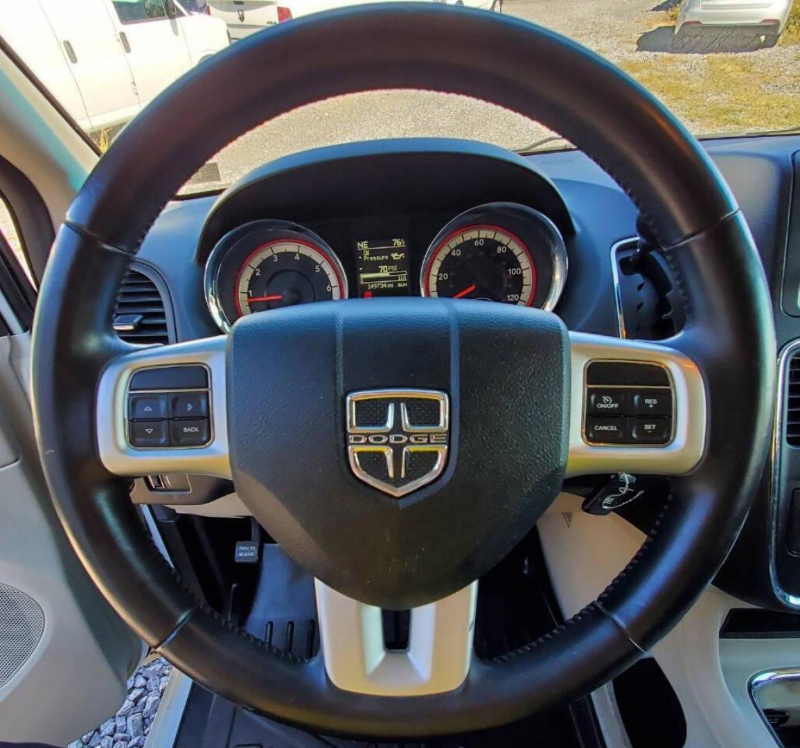 2015 White Dodge Grand Caravan (2C4RDGCG4FR) with an 3.6L V6 3.6L V6 engine, located at 4845 Woodbury Pike, Roaring Springs, PA, (814) 317-5008, (814) 317-5008, 40.250935, -78.366959 - 2015 Dodge Grand Caravan SXT 3.6L V6 Automatic 149k Miles FWD Third Row Seating This van is loaded! Sirius Radio with Single Disc CD Player, Bluetooth, DVD Player with Remote, Rear Folding Seats, Back-up Camera, Power Liftgate. Priced low because it has an R-Title due to a cracked bumper and dent in - Photo#18