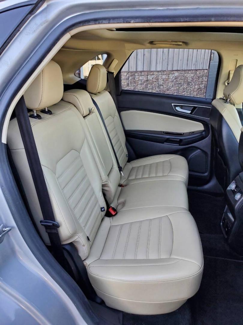 2015 Silver Ford Edge (2FMTK4J90FB) with an 2.0L I4 Turbocharger 2.0L I4 engine, located at 4845 Woodbury Pike, Roaring Springs, PA, (814) 317-5008, (814) 317-5008, 40.250935, -78.366959 - 2015 Ford Edge SEL AWD 4 dr Crossover 2.0L I4 Turbocharger 171k miles Fully serviced and ready to go! New brakes and rotors all around. Leather, Sirius XM, Single CD Player, Bluetooth, Back-up Camera, Heated Seats, Heated Side Mirrors, Moon Roof. Selling so cheap because it has an R-Title due to a h - Photo#15