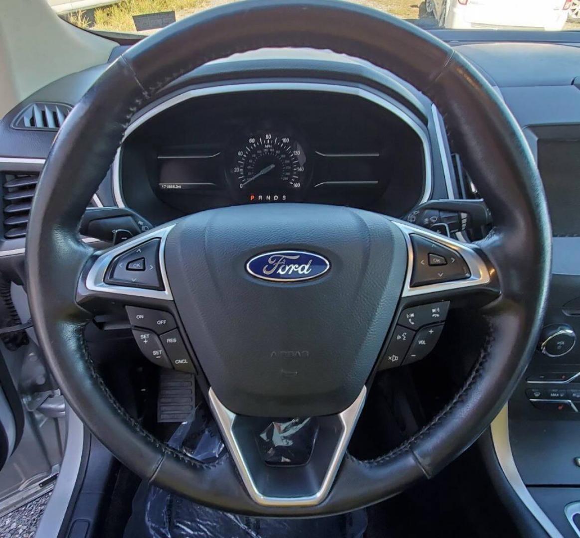 2015 Silver Ford Edge (2FMTK4J90FB) with an 2.0L I4 Turbocharger 2.0L I4 engine, located at 4845 Woodbury Pike, Roaring Springs, PA, (814) 317-5008, (814) 317-5008, 40.250935, -78.366959 - 2015 Ford Edge SEL AWD 4 dr Crossover 2.0L I4 Turbocharger 171k miles Fully serviced and ready to go! New brakes and rotors all around. Leather, Sirius XM, Single CD Player, Bluetooth, Back-up Camera, Heated Seats, Heated Side Mirrors, Moon Roof. Selling so cheap because it has an R-Title due to a h - Photo#20