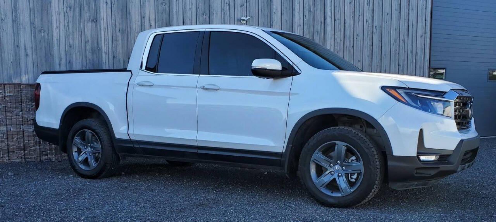 2023 White Honda Ridgeline (5FPYK3F50PB) with an 3.5L V6 3.5L V6 engine, located at 4845 Woodbury Pike, Roaring Springs, PA, (814) 317-5008, (814) 317-5008, 40.250935, -78.366959 - 2023 Honda Ridgeline RTL AWD Crew Cab 3.5L V6 9-speed Automatic 7,547 miles Fully Loaded!! Leather, Remote Start, Universal Remote Transmitter - Homelink - Garage Door Opener, Trailer Hitch, Backup Camera, Apple Carplay, Android Auto, Bluetooth, Sirius XM, Subwoofer, Sunroof, Lane Keeping Assist, He - Photo#1