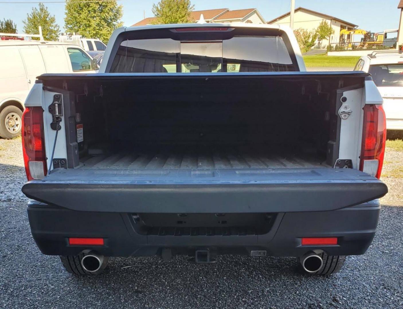 2023 White Honda Ridgeline (5FPYK3F50PB) with an 3.5L V6 3.5L V6 engine, located at 4845 Woodbury Pike, Roaring Springs, PA, (814) 317-5008, (814) 317-5008, 40.250935, -78.366959 - 2023 Honda Ridgeline RTL AWD Crew Cab 3.5L V6 9-speed Automatic 7,547 miles Fully Loaded!! Leather, Remote Start, Universal Remote Transmitter - Homelink - Garage Door Opener, Trailer Hitch, Backup Camera, Apple Carplay, Android Auto, Bluetooth, Sirius XM, Subwoofer, Sunroof, Lane Keeping Assist, He - Photo#3