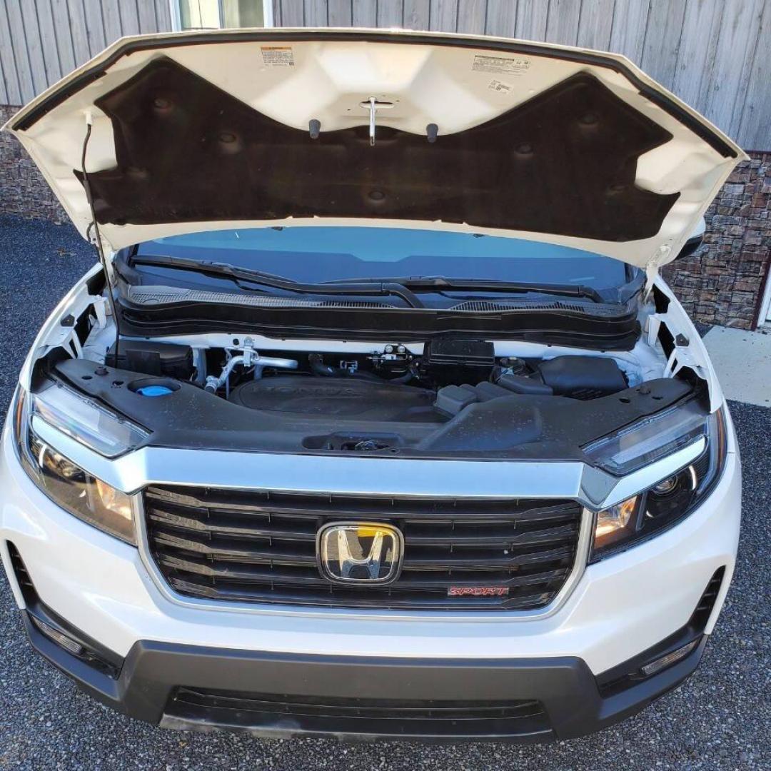 2023 White Honda Ridgeline (5FPYK3F50PB) with an 3.5L V6 3.5L V6 engine, located at 4845 Woodbury Pike, Roaring Springs, PA, (814) 317-5008, (814) 317-5008, 40.250935, -78.366959 - 2023 Honda Ridgeline RTL AWD Crew Cab 3.5L V6 9-speed Automatic 7,547 miles Fully Loaded!! Leather, Remote Start, Universal Remote Transmitter - Homelink - Garage Door Opener, Trailer Hitch, Backup Camera, Apple Carplay, Android Auto, Bluetooth, Sirius XM, Subwoofer, Sunroof, Lane Keeping Assist, He - Photo#5