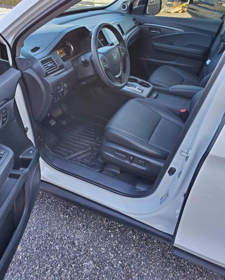 2023 White Honda Ridgeline (5FPYK3F50PB) with an 3.5L V6 3.5L V6 engine, located at 4845 Woodbury Pike, Roaring Springs, PA, (814) 317-5008, (814) 317-5008, 40.250935, -78.366959 - 2023 Honda Ridgeline RTL AWD Crew Cab 3.5L V6 9-speed Automatic 7,547 miles Fully Loaded!! Leather, Remote Start, Universal Remote Transmitter - Homelink - Garage Door Opener, Trailer Hitch, Backup Camera, Apple Carplay, Android Auto, Bluetooth, Sirius XM, Subwoofer, Sunroof, Lane Keeping Assist, He - Photo#9