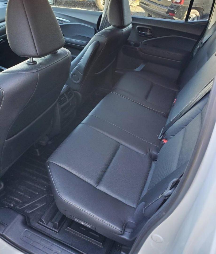 2023 White Honda Ridgeline (5FPYK3F50PB) with an 3.5L V6 3.5L V6 engine, located at 4845 Woodbury Pike, Roaring Springs, PA, (814) 317-5008, (814) 317-5008, 40.250935, -78.366959 - 2023 Honda Ridgeline RTL AWD Crew Cab 3.5L V6 9-speed Automatic 7,547 miles Fully Loaded!! Leather, Remote Start, Universal Remote Transmitter - Homelink - Garage Door Opener, Trailer Hitch, Backup Camera, Apple Carplay, Android Auto, Bluetooth, Sirius XM, Subwoofer, Sunroof, Lane Keeping Assist, He - Photo#11