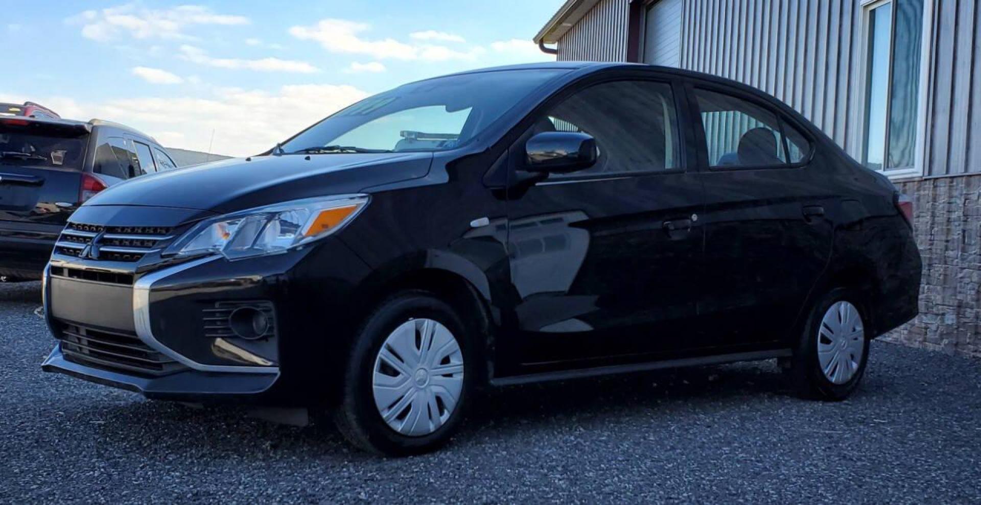 2023 Black Mitsubishi Mirage G4 (ML32FUFJ4PH) with an 1.2L I3 1.2L I3 engine, located at 4845 Woodbury Pike, Roaring Springs, PA, (814) 317-5008, (814) 317-5008, 40.250935, -78.366959 - 2023 Mitsubishi Mirage G4 SE 1.2L I3 FWD Only 53k miles! Rear Back-up Camera, Apply Car Play, Android Auto, Bluetooth. Very clean car! Selling so cheap because it has an R-Title due to damage to the bumper cover and passenger fender. These have been repaired. Will come with a 3 mo./3,000-mile powert - Photo#4