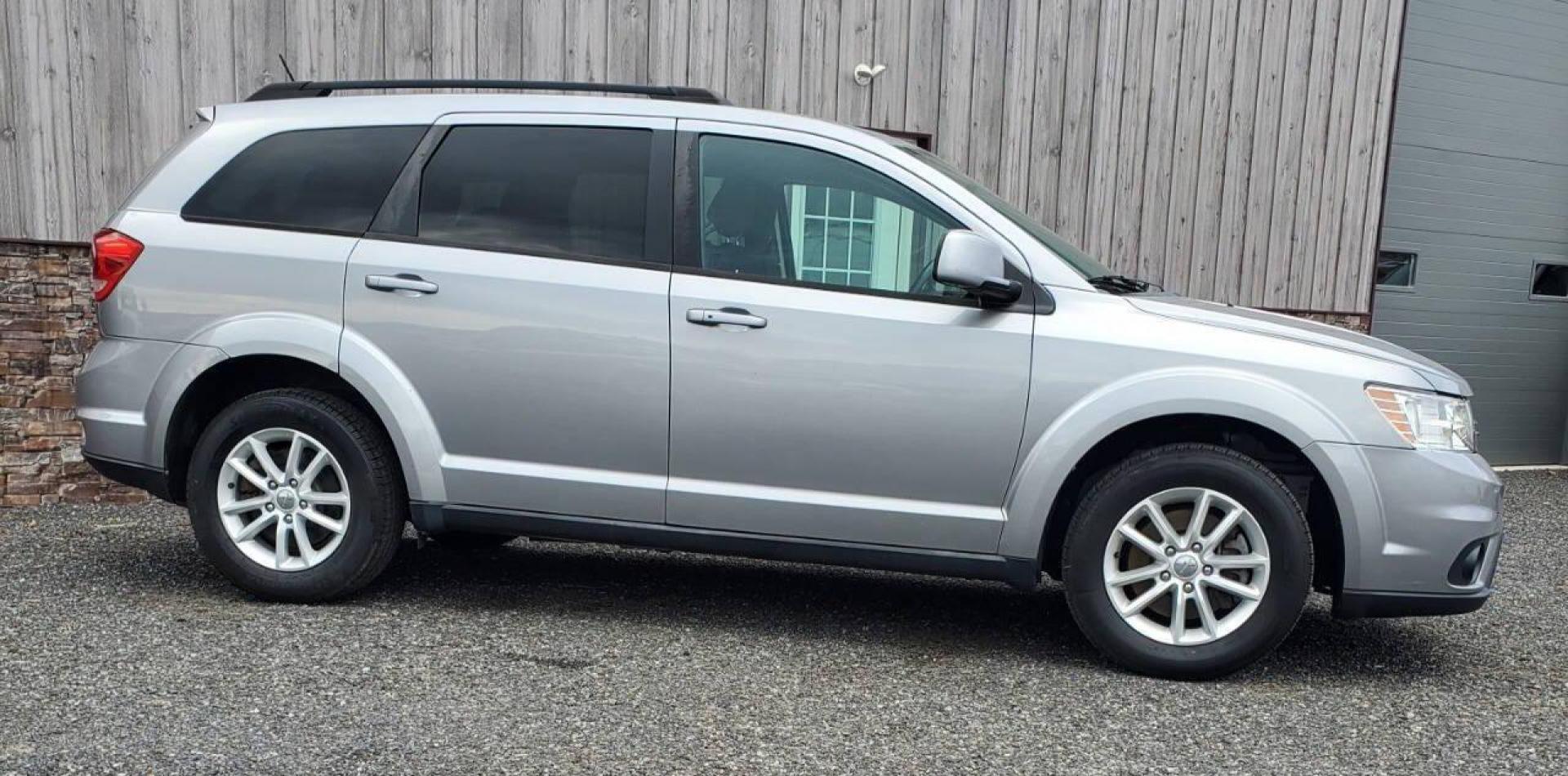 2015 Silver Dodge Journey (3C4PDCBG1FT) with an 3.6L V6 3.6L V6 engine, located at 4845 Woodbury Pike, Roaring Springs, PA, (814) 317-5008, (814) 317-5008, 40.250935, -78.366959 - 2015 Dodge Journey SXT FWD 3.6L V6 Automatic 155k miles 3rd Row Seating, CD Player, SiriusXM, Power Windows, Locks and Mirrors, A/C. Very clean vehicle! Selling cheaply because it has an R-Title due to previous deer damage to the passenger fender. This vehicle will come with a 3 mo./3,000-mile warra - Photo#1