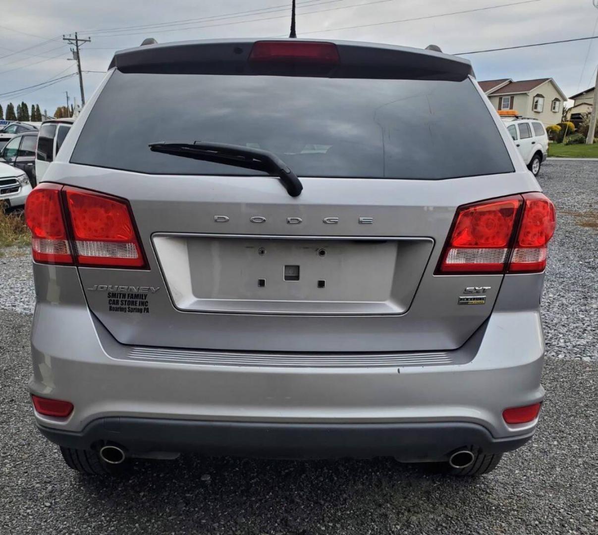 2015 Silver Dodge Journey (3C4PDCBG1FT) with an 3.6L V6 3.6L V6 engine, located at 4845 Woodbury Pike, Roaring Springs, PA, (814) 317-5008, (814) 317-5008, 40.250935, -78.366959 - 2015 Dodge Journey SXT FWD 3.6L V6 Automatic 155k miles 3rd Row Seating, CD Player, SiriusXM, Power Windows, Locks and Mirrors, A/C. Very clean vehicle! Selling cheaply because it has an R-Title due to previous deer damage to the passenger fender. This vehicle will come with a 3 mo./3,000-mile warra - Photo#2