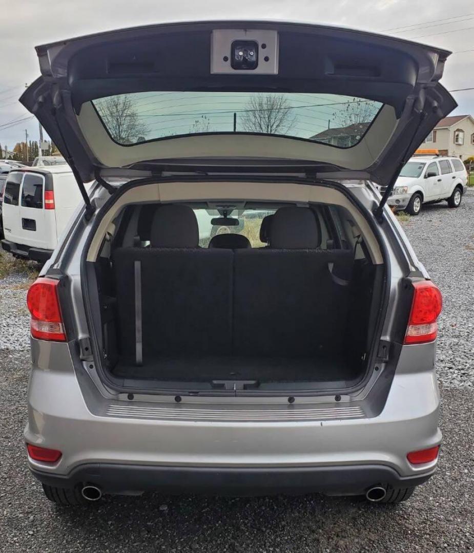 2015 Silver Dodge Journey (3C4PDCBG1FT) with an 3.6L V6 3.6L V6 engine, located at 4845 Woodbury Pike, Roaring Springs, PA, (814) 317-5008, (814) 317-5008, 40.250935, -78.366959 - 2015 Dodge Journey SXT FWD 3.6L V6 Automatic 155k miles 3rd Row Seating, CD Player, SiriusXM, Power Windows, Locks and Mirrors, A/C. Very clean vehicle! Selling cheaply because it has an R-Title due to previous deer damage to the passenger fender. This vehicle will come with a 3 mo./3,000-mile warra - Photo#3