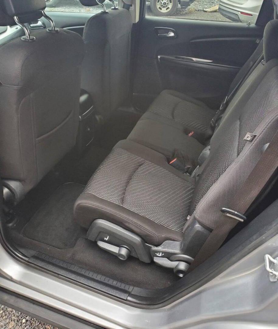 2015 Silver Dodge Journey (3C4PDCBG1FT) with an 3.6L V6 3.6L V6 engine, located at 4845 Woodbury Pike, Roaring Springs, PA, (814) 317-5008, (814) 317-5008, 40.250935, -78.366959 - 2015 Dodge Journey SXT FWD 3.6L V6 Automatic 155k miles 3rd Row Seating, CD Player, SiriusXM, Power Windows, Locks and Mirrors, A/C. Very clean vehicle! Selling cheaply because it has an R-Title due to previous deer damage to the passenger fender. This vehicle will come with a 3 mo./3,000-mile warra - Photo#10