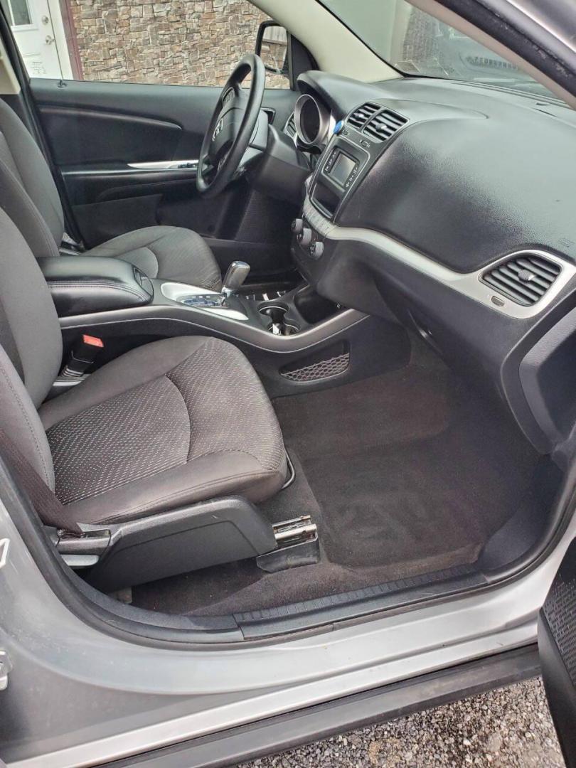 2015 Silver Dodge Journey (3C4PDCBG1FT) with an 3.6L V6 3.6L V6 engine, located at 4845 Woodbury Pike, Roaring Springs, PA, (814) 317-5008, (814) 317-5008, 40.250935, -78.366959 - 2015 Dodge Journey SXT FWD 3.6L V6 Automatic 155k miles 3rd Row Seating, CD Player, SiriusXM, Power Windows, Locks and Mirrors, A/C. Very clean vehicle! Selling cheaply because it has an R-Title due to previous deer damage to the passenger fender. This vehicle will come with a 3 mo./3,000-mile warra - Photo#12