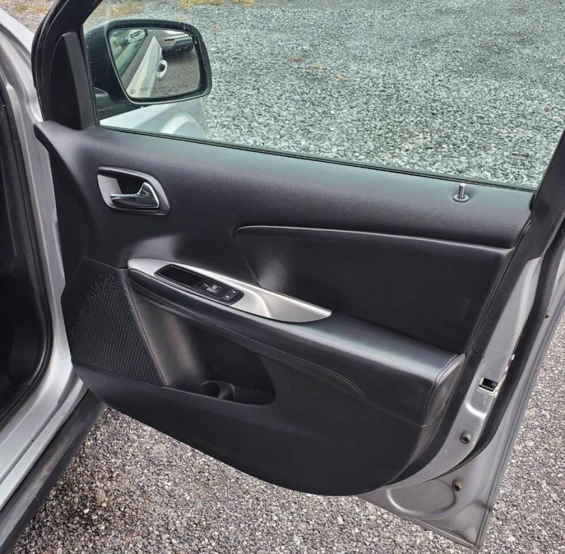 2015 Silver Dodge Journey (3C4PDCBG1FT) with an 3.6L V6 3.6L V6 engine, located at 4845 Woodbury Pike, Roaring Springs, PA, (814) 317-5008, (814) 317-5008, 40.250935, -78.366959 - 2015 Dodge Journey SXT FWD 3.6L V6 Automatic 155k miles 3rd Row Seating, CD Player, SiriusXM, Power Windows, Locks and Mirrors, A/C. Very clean vehicle! Selling cheaply because it has an R-Title due to previous deer damage to the passenger fender. This vehicle will come with a 3 mo./3,000-mile warra - Photo#13