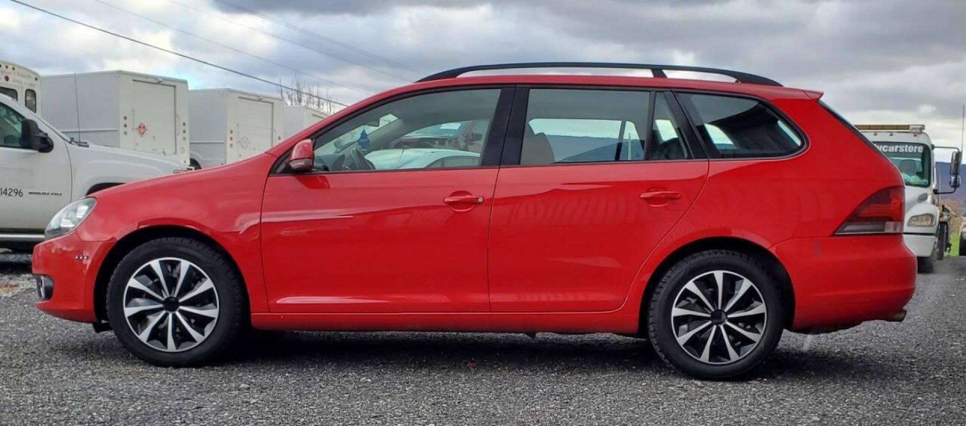 2013 Red Volkswagen Jetta (3VWPP7AJ2DM) with an 2.5L I5 2.5L I5 engine, located at 4845 Woodbury Pike, Roaring Springs, PA, (814) 317-5008, (814) 317-5008, 40.250935, -78.366959 - 2013 Volkswagen Jetta SportWagen S 2.5L FWD Automatic 117k miles Heated Seats, Bluetooth, CD Player, Power Windows/Locks/Mirrors, AC Selling cheaply because of the R-Title due to previous lower bumper/grill damage. This vehicle will come with a 3 mo./3,000-mile warranty with the option to upgrade. I - Photo#4