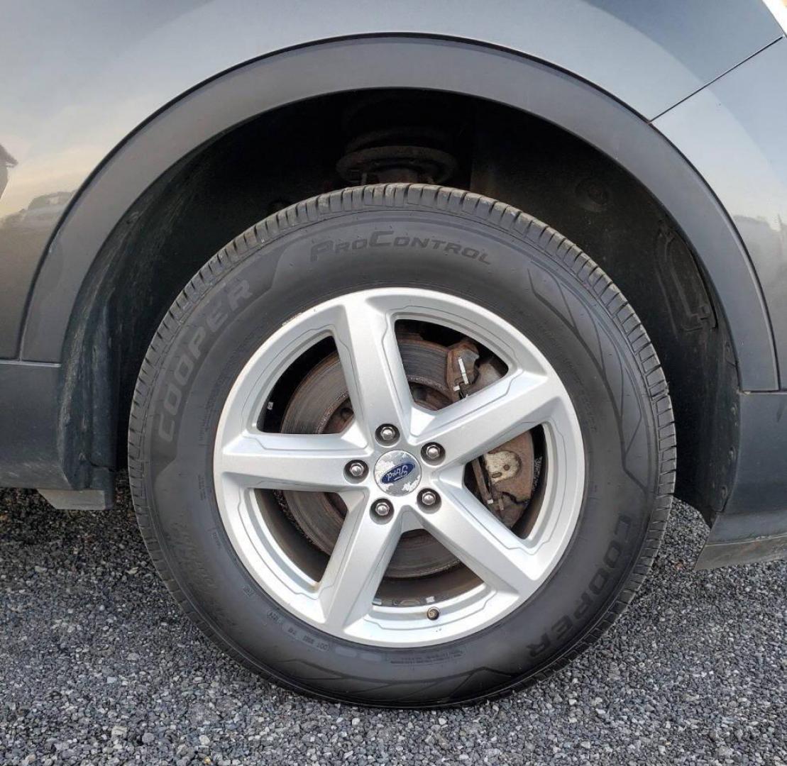 2017 Pewter Ford Explorer (1FM5K8D85HG) with an 3.5L V6 290hp 255ft. lbs. 3.5L V6 engine, located at 4845 Woodbury Pike, Roaring Springs, PA, (814) 317-5008, (814) 317-5008, 40.250935, -78.366959 - 2017 Ford Explorer XLT AWD Automatic 3.5L V6 128k Miles 1 owner vehicle! 3rd Row Seating, Rear Back-up Camera, Keypad Entry, Sync, Bluetooth, CD Player, Sirius XM Vehicle will come with new inspection and 3-month/3,000-mile warranty with the option to upgrade. If you have any questions or would like - Photo#6