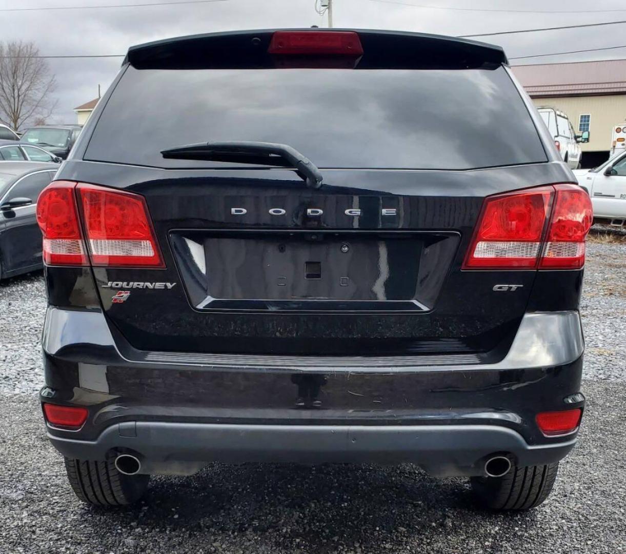 2019 Black Dodge Journey (3C4PDDEG3KT) with an Pentastar 3.6L V6 283hp 260ft. lbs. 3.6L V6 engine, located at 4845 Woodbury Pike, Roaring Springs, PA, (814) 317-5008, (814) 317-5008, 40.250935, -78.366959 - 2019 Dodge Journey GT AWD 3.6L V6 6-Speed Automatic 111k Miles Remote Start, 3rd Row Seating, Rear Back-up Camera, Cruise Control, Uconnect, Bluetooth, CD Player, Sirius XM. This vehicle will come with New Inspection and a 3 mo./3,000-mile warranty with the option to upgrade. If you have any questi - Photo#2