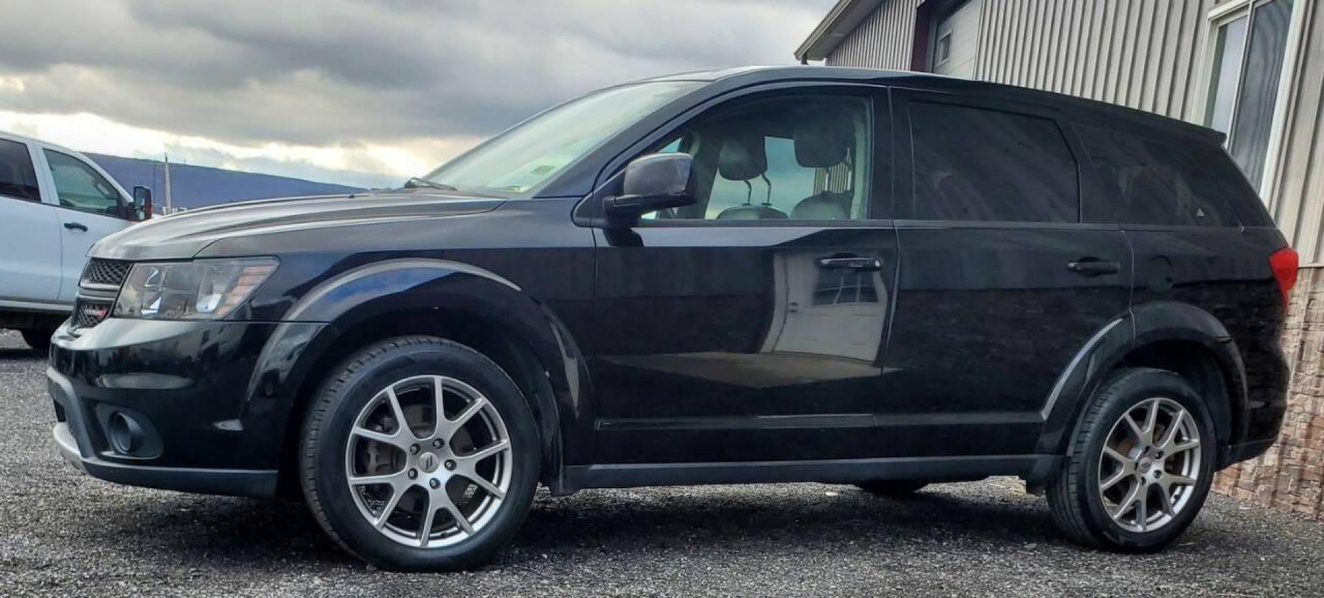 2019 Black Dodge Journey (3C4PDDEG3KT) with an Pentastar 3.6L V6 283hp 260ft. lbs. 3.6L V6 engine, located at 4845 Woodbury Pike, Roaring Springs, PA, (814) 317-5008, (814) 317-5008, 40.250935, -78.366959 - 2019 Dodge Journey GT AWD 3.6L V6 6-Speed Automatic 111k Miles Remote Start, 3rd Row Seating, Rear Back-up Camera, Cruise Control, Uconnect, Bluetooth, CD Player, Sirius XM. This vehicle will come with New Inspection and a 3 mo./3,000-mile warranty with the option to upgrade. If you have any questi - Photo#3