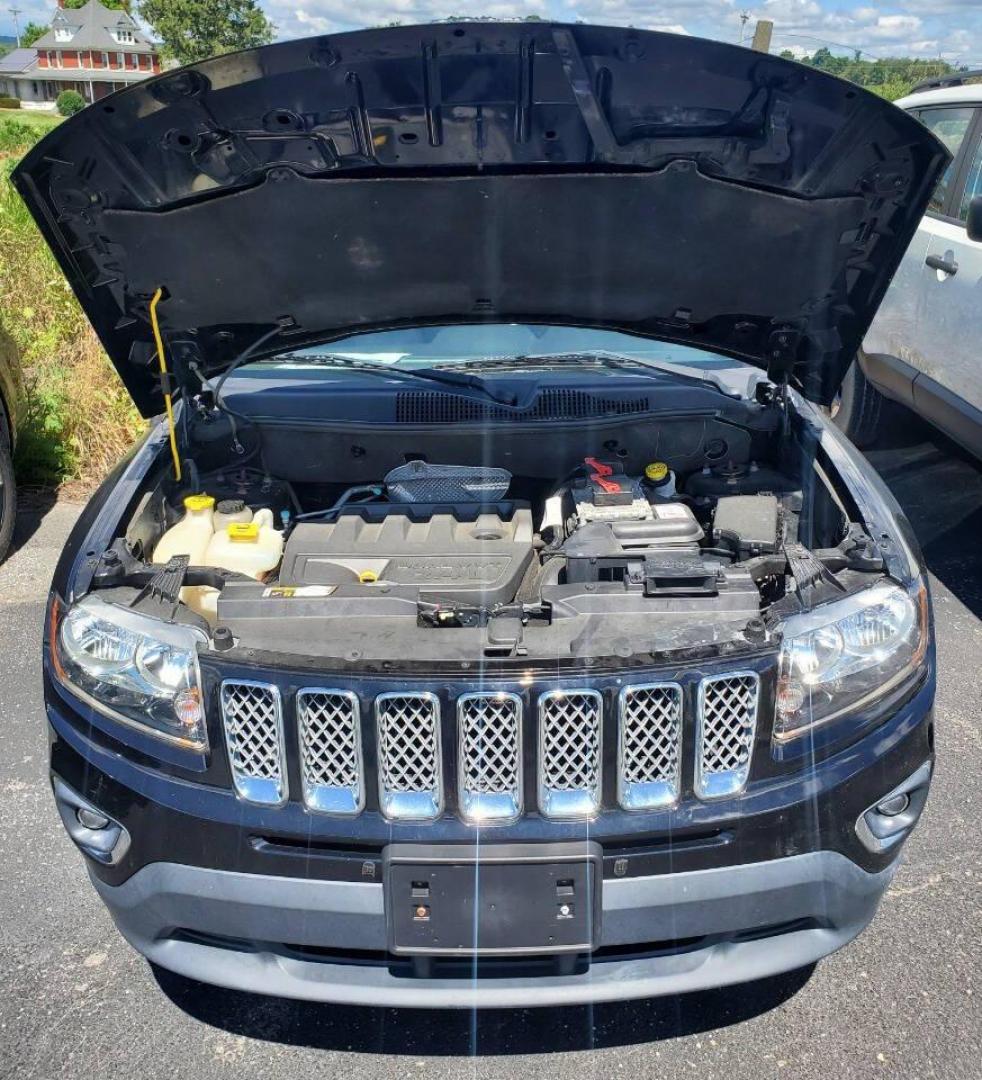2015 Black Jeep Compass (1C4NJDEBXFD) with an 2.4L I4 172hp 165ft. lbs. 2.4L I4 engine, located at 4845 Woodbury Pike, Roaring Springs, PA, (814) 317-5008, (814) 317-5008, 40.250935, -78.366959 - 2015 Jeep Compass High Altitude Edition 4x4 2.4L I4 Automatic 6-speed 184k Miles Leather, Heated Seats, Sirius XM, CD Player, Sunroof, Cruise Control, Keyless Entry. Nice Southern vehicle! New Inspection! Vehicle will come with a 3 month/3,000-mile warranty with the option to upgrade. If you have an - Photo#5