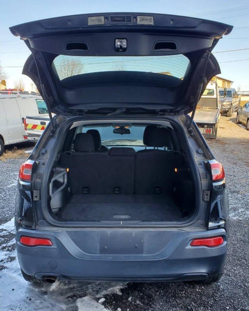 2015 Black Jeep Cherokee (1C4PJMCB9FW) with an 2.4L I4 180hp 171ft. lbs. 2.4L I4 engine, located at 4845 Woodbury Pike, Roaring Springs, PA, (814) 317-5008, (814) 317-5008, 40.250935, -78.366959 - 2015 Jeep Cherokee Latitude 4x4 2.4L I4 Automatic 9-speed 181k Miles Remote Start, Rear Back-up Camera, Cruise Control, Keyless Entry, Bluetooth, Terrain Select. Vehicle has an R-Title due to previous cosmetic damage to the front bumper and grill. New Inspection. Vehicle will come with a 3 month/3,0 - Photo#3