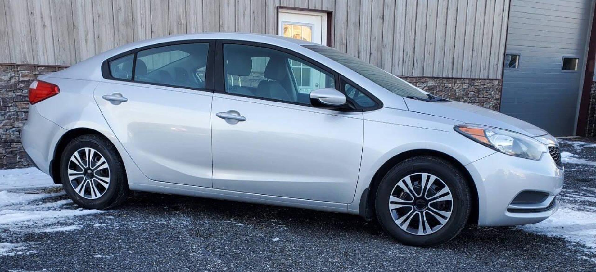 2016 Silver Kia Forte (KNAFK4A6XG5) with an 1.8L I4 145hp 130ft. lbs. 1.8L I4 engine, located at 4845 Woodbury Pike, Roaring Springs, PA, (814) 317-5008, (814) 317-5008, 40.250935, -78.366959 - **Sale Pending** 2016 Kia Forte LX 1.8L I4 FWD Automatic 6-speed 76k Miles A/c, Keyless Entry, Sirius XM, Bluetooth, CD Player Rust-free Southern Vehicle! New Inspection Vehicle will come with a 3 month/3,000-mile warranty with the option to upgrade. If you have any questions or to schedule a test - Photo#1