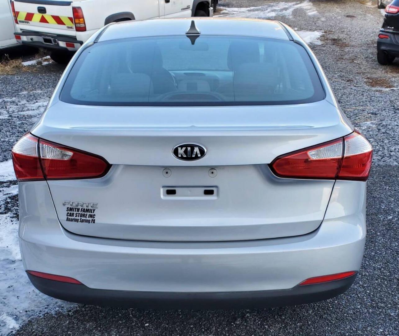 2016 Silver Kia Forte (KNAFK4A6XG5) with an 1.8L I4 145hp 130ft. lbs. 1.8L I4 engine, located at 4845 Woodbury Pike, Roaring Springs, PA, (814) 317-5008, (814) 317-5008, 40.250935, -78.366959 - **Sale Pending** 2016 Kia Forte LX 1.8L I4 FWD Automatic 6-speed 76k Miles A/c, Keyless Entry, Sirius XM, Bluetooth, CD Player Rust-free Southern Vehicle! New Inspection Vehicle will come with a 3 month/3,000-mile warranty with the option to upgrade. If you have any questions or to schedule a test - Photo#2