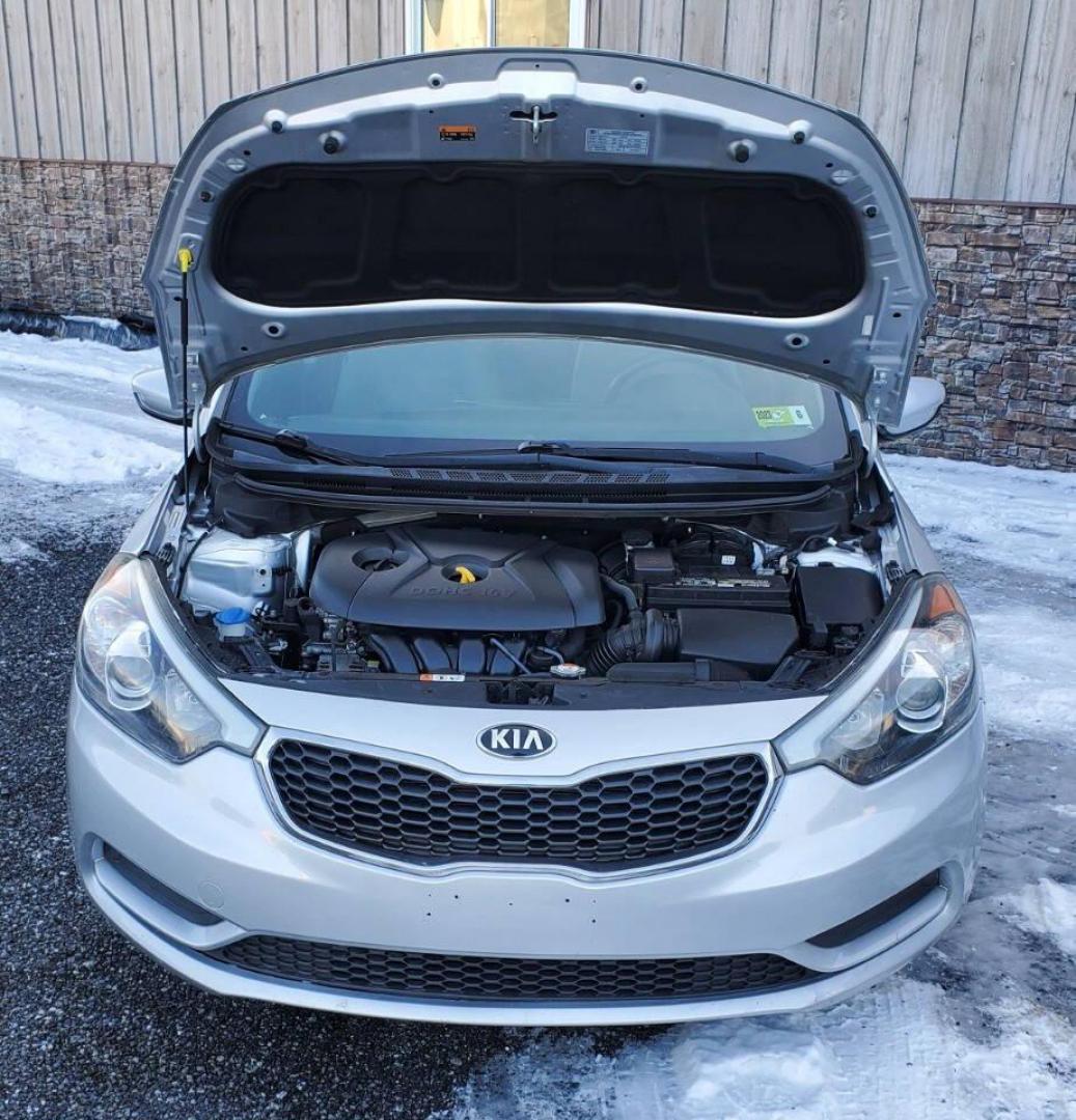 2016 Silver Kia Forte (KNAFK4A6XG5) with an 1.8L I4 145hp 130ft. lbs. 1.8L I4 engine, located at 4845 Woodbury Pike, Roaring Springs, PA, (814) 317-5008, (814) 317-5008, 40.250935, -78.366959 - **Sale Pending** 2016 Kia Forte LX 1.8L I4 FWD Automatic 6-speed 76k Miles A/c, Keyless Entry, Sirius XM, Bluetooth, CD Player Rust-free Southern Vehicle! New Inspection Vehicle will come with a 3 month/3,000-mile warranty with the option to upgrade. If you have any questions or to schedule a test - Photo#4