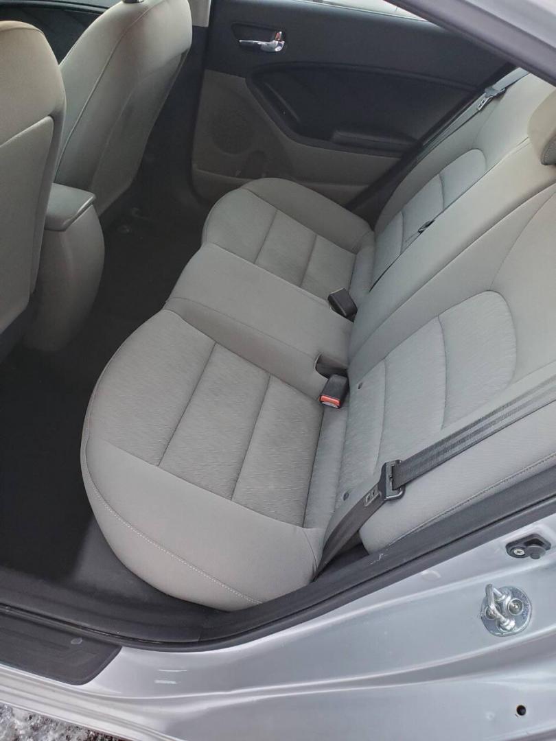 2016 Silver Kia Forte (KNAFK4A6XG5) with an 1.8L I4 145hp 130ft. lbs. 1.8L I4 engine, located at 4845 Woodbury Pike, Roaring Springs, PA, (814) 317-5008, (814) 317-5008, 40.250935, -78.366959 - **Sale Pending** 2016 Kia Forte LX 1.8L I4 FWD Automatic 6-speed 76k Miles A/c, Keyless Entry, Sirius XM, Bluetooth, CD Player Rust-free Southern Vehicle! New Inspection Vehicle will come with a 3 month/3,000-mile warranty with the option to upgrade. If you have any questions or to schedule a test - Photo#9