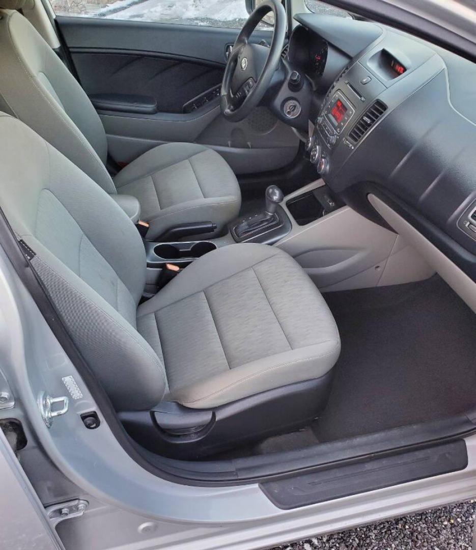 2016 Silver Kia Forte (KNAFK4A6XG5) with an 1.8L I4 145hp 130ft. lbs. 1.8L I4 engine, located at 4845 Woodbury Pike, Roaring Springs, PA, (814) 317-5008, (814) 317-5008, 40.250935, -78.366959 - **Sale Pending** 2016 Kia Forte LX 1.8L I4 FWD Automatic 6-speed 76k Miles A/c, Keyless Entry, Sirius XM, Bluetooth, CD Player Rust-free Southern Vehicle! New Inspection Vehicle will come with a 3 month/3,000-mile warranty with the option to upgrade. If you have any questions or to schedule a test - Photo#11