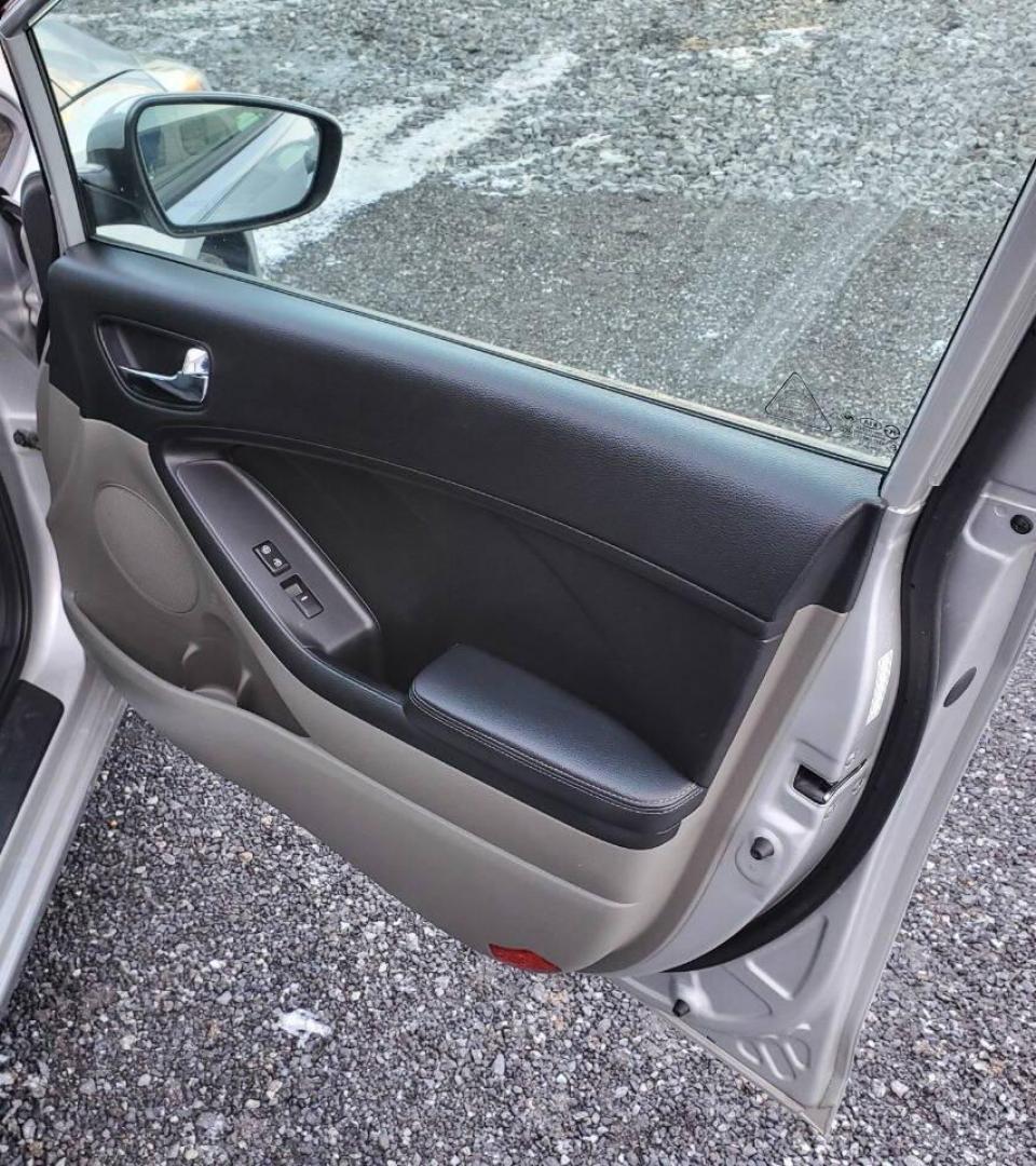 2016 Silver Kia Forte (KNAFK4A6XG5) with an 1.8L I4 145hp 130ft. lbs. 1.8L I4 engine, located at 4845 Woodbury Pike, Roaring Springs, PA, (814) 317-5008, (814) 317-5008, 40.250935, -78.366959 - **Sale Pending** 2016 Kia Forte LX 1.8L I4 FWD Automatic 6-speed 76k Miles A/c, Keyless Entry, Sirius XM, Bluetooth, CD Player Rust-free Southern Vehicle! New Inspection Vehicle will come with a 3 month/3,000-mile warranty with the option to upgrade. If you have any questions or to schedule a test - Photo#13