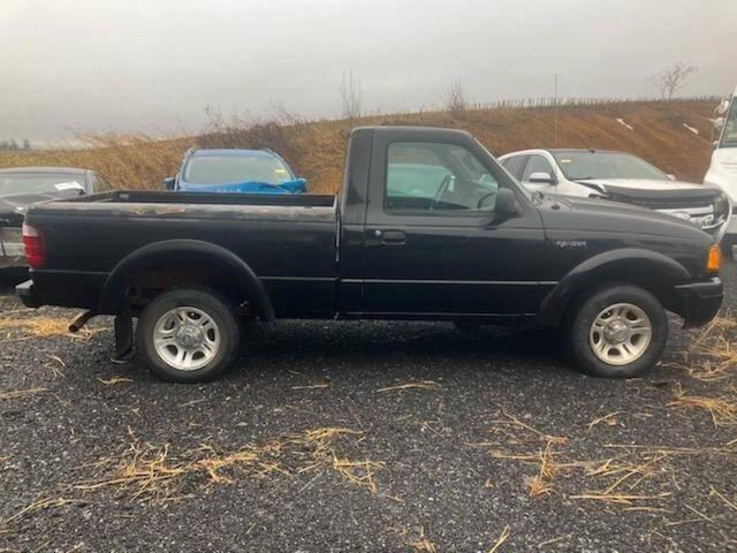 2003 Black Ford Ranger (1FTYR10UX3T) with an 3.0L V6 3.0L V6 engine, located at 4845 Woodbury Pike, Roaring Springs, PA, (814) 317-5008, (814) 317-5008, 40.250935, -78.366959 - 2003 Ford Ranger Edge 3.0L V6 Automatic 226K miles RWD Clean Title, being sold As Is. Southern truck that runs and drives great! No mechanical issues. It was driven over 200 miles home from the auction with no issues. It will need inspected for PA because it is from Virginia. If you have any questi - Photo#1
