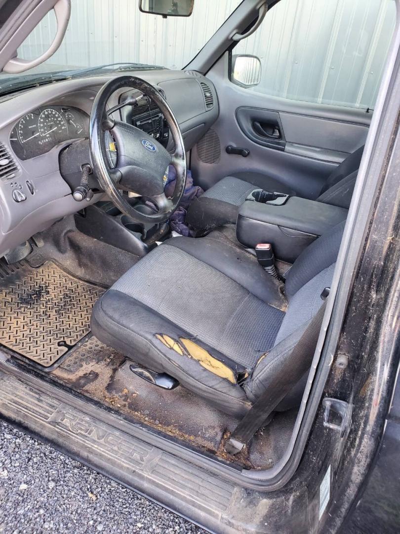 2003 Black Ford Ranger (1FTYR10UX3T) with an 3.0L V6 3.0L V6 engine, located at 4845 Woodbury Pike, Roaring Springs, PA, (814) 317-5008, (814) 317-5008, 40.250935, -78.366959 - 2003 Ford Ranger Edge 3.0L V6 Automatic 226K miles RWD Clean Title, being sold As Is. Southern truck that runs and drives great! No mechanical issues. It was driven over 200 miles home from the auction with no issues. It will need inspected for PA because it is from Virginia. If you have any questi- Photo#4