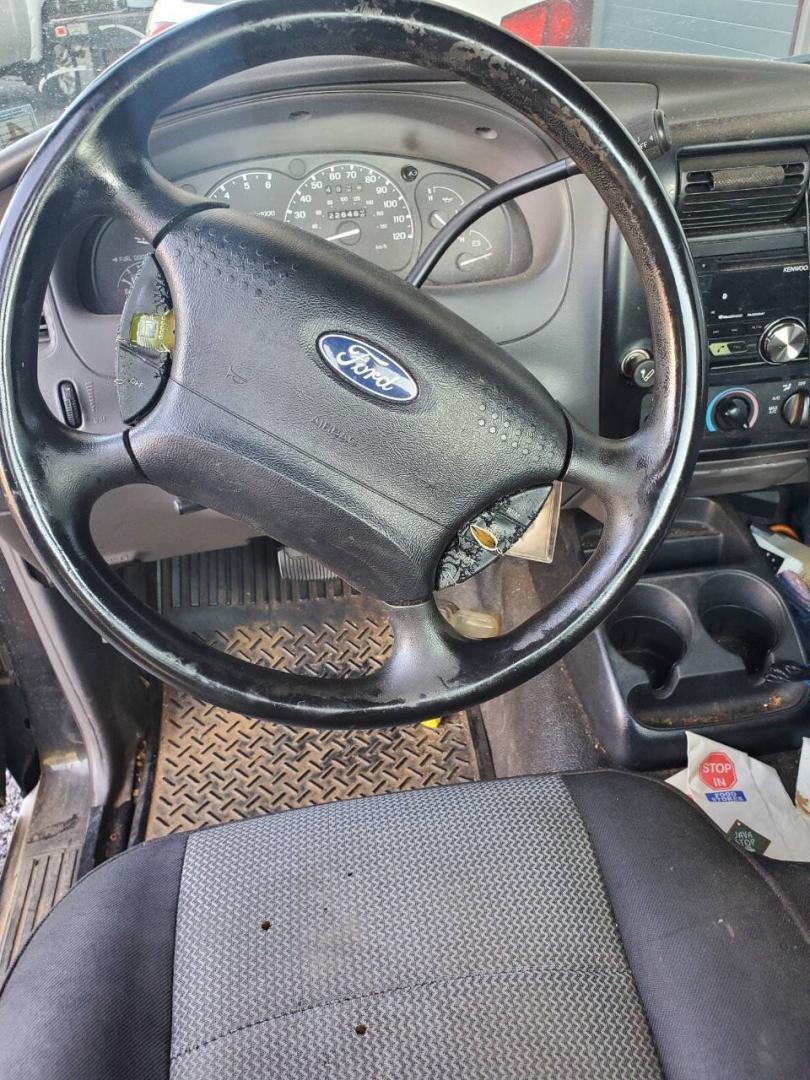 2003 Black Ford Ranger (1FTYR10UX3T) with an 3.0L V6 3.0L V6 engine, located at 4845 Woodbury Pike, Roaring Springs, PA, (814) 317-5008, (814) 317-5008, 40.250935, -78.366959 - 2003 Ford Ranger Edge 3.0L V6 Automatic 226K miles RWD Clean Title, being sold As Is. Southern truck that runs and drives great! No mechanical issues. It was driven over 200 miles home from the auction with no issues. It will need inspected for PA because it is from Virginia. If you have any questi- Photo#7
