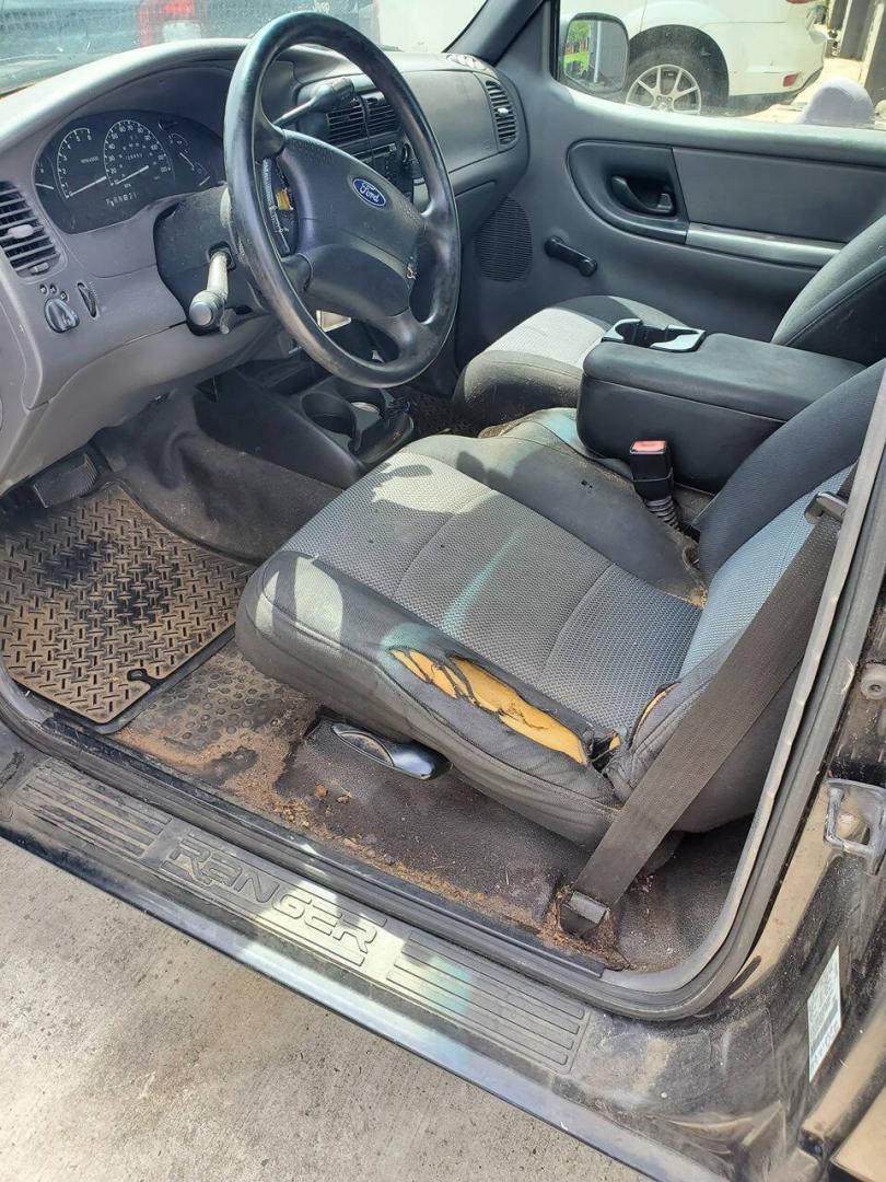 2003 Black Ford Ranger (1FTYR10UX3T) with an 3.0L Flex Fuel V6 154hp 180ft. lbs. 3.0L V6 engine, located at 4845 Woodbury Pike, Roaring Springs, PA, (814) 317-5008, (814) 317-5008, 40.250935, -78.366959 - 2003 Ford Ranger Edge 3.0L V6 Automatic 226K miles RWD Aftermarket Kenwood single CD player. Clean Title, being sold As Is. Southern truck that runs and drives great! No mechanical issues. It was driven over 200 miles home from the auction with no issues. It will need inspected for PA because it is- Photo#7