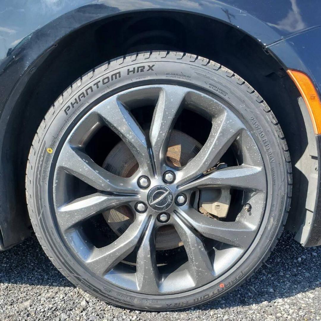 2015 Black Chrysler 200 (1C3CCCDG4FN) with an 3.6L V6 295hp 262ft. lbs. 3.6L V6 engine, located at 4845 Woodbury Pike, Roaring Springs, PA, (814) 317-5008, (814) 317-5008, 40.250935, -78.366959 - 2015 Chrysler 200 S 3.6L V6 AWD 9-Speed Automatic 74K Miles New Tires, Heated Seats and Steering Wheel, Remote Start, Dual-Pane Panoramic Sunroof, Rear Back-up Camera, A/c, Cruise Control, Power Windows/Locks, Bluetooth, Sirius XM. Nice Southern Car! Will come with new inspection and a 3-month/3,000 - Photo#5